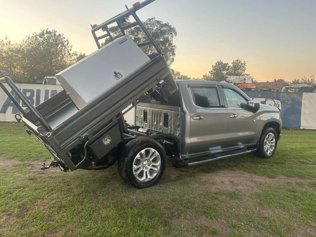 Custom tipper on Chev Silverado; extended.