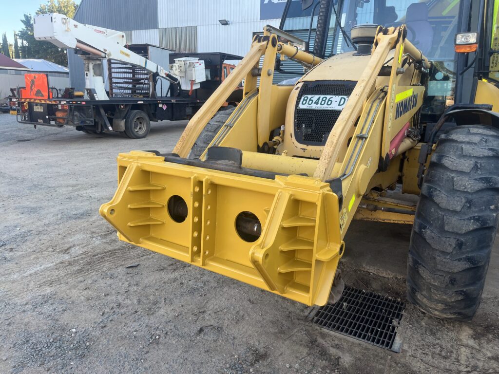 Custom designed front end loader; front on.